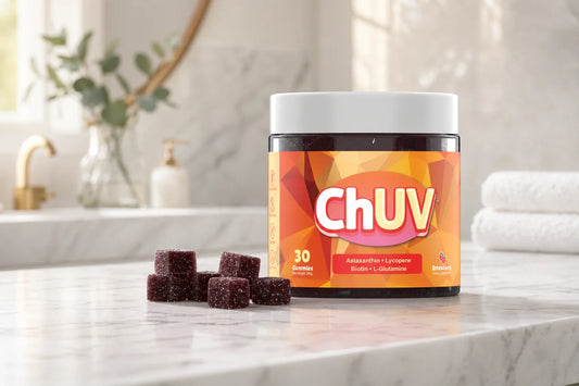 ChUV tanning gummies jar on marble surface beside prenatal vitamins natural light pregnancy safety blog
