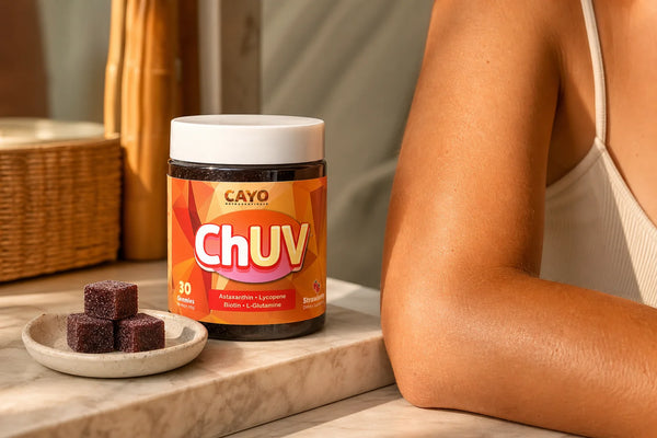 ChUV Tanning Gummies bottle on a sunlit vanity shelf representing the 6-month tanning gummy journey toward a natural golden glow