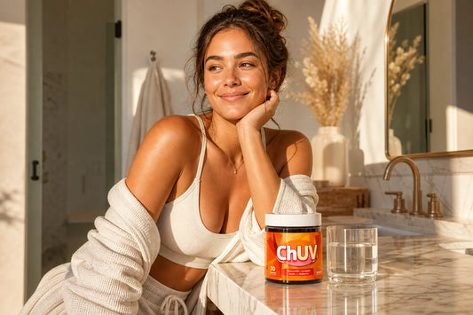 Woman with a natural sun-kissed glow in maintenance mode beside a bottle of ChUV Tanning Gummies at sunrise