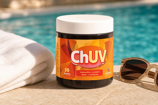 ChUV tanning gummies bottle on a sunny poolside table, illustrating the safer path in tanning gummies vs nasal tanners