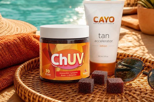 ChUV tanning gummies bottle and tan accelerator lotion side by side on a poolside tray, comparing tanning gummies vs tan accelerator lotion approaches